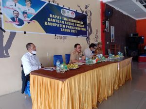 Sekda Zulfinasran Buka Rakor Bansos Pangan Parimo 2021