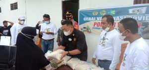 KONI Sulteng dan Parimo Buka Gerai Vaksinasi sekaligus Pemberian Sembako